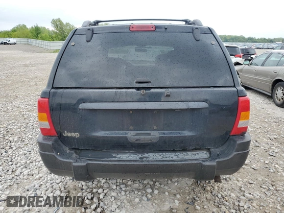 2000 Jeep Grand Cherokee Laredo z VIN 1J4GW48S1YC326453, wystawiony jako Copart lot #57332675 z przebiegiem 290 059 mil mil oraz Czysty tytuł • Clean title. Historia ofert i sprzedaży dostępna na DreamBid. Obrazek 6.