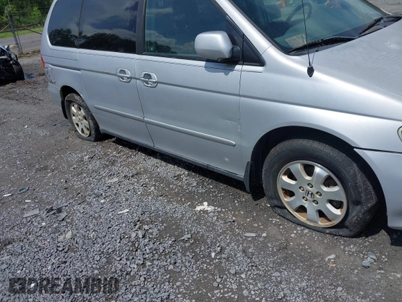 2002 Honda Odyssey EX z VIN 2HKRL18692H526842, wystawiony jako IAAI lot #42495810 z przebiegiem 220 289 mil mil oraz . Historia ofert i sprzedaży dostępna na DreamBid. Obrazek 6.