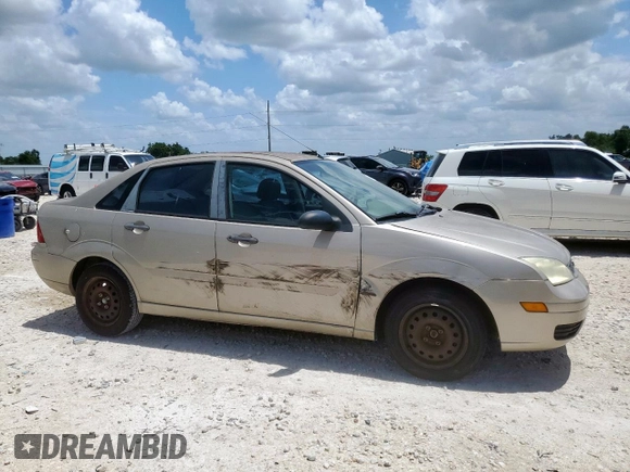 2006 Ford Focus S with VIN 1FAFP34N26W225772, listed as a Copart auction lot 62657045 with 117,078 mi miles and Salvage title. Bid and sale history available at DreamBid. Image 4.