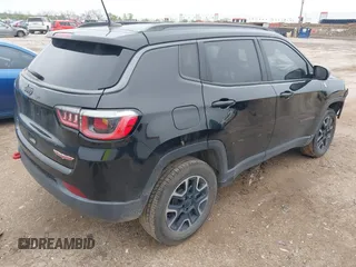 2019 Jeep Compass Trailhawk z VIN 3C4NJDDB5KT618149, wystawiony jako IAAI lot #41959320 z przebiegiem 99 795 mil mil oraz . Historia ofert i sprzedaży dostępna na DreamBid. Obrazek 4.