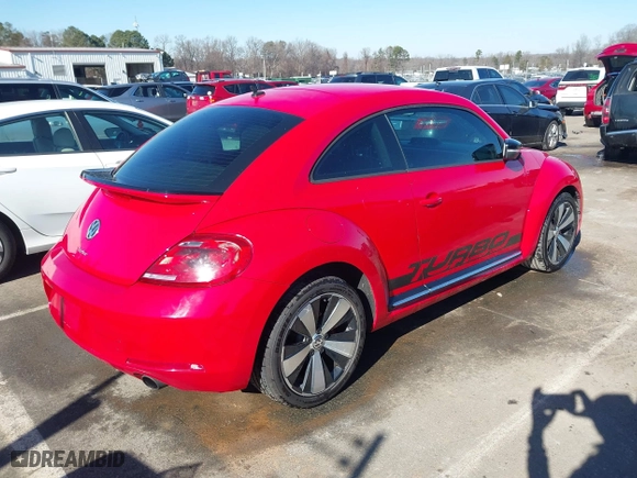2012 Volkswagen Beetle 2.0T Turbo w/Sun/Sound with VIN 3VWV67ATXCM650376, listed as a IAAI auction lot 41315431 with 104,523 mi miles. Bid and sale history available at carsss.com. Image 4.