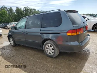 2003 Honda Odyssey EX-L with VIN 5FNRL18933B116127, listed as a Copart auction lot 56013645 with 157,118 mi miles and Salvage Title. Bid and sale history available at DreamBid. Image 2.