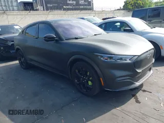 2023 Ford Mustang Mach-E Premium z VIN 3FMTK3R78PMA91790, wystawiony jako IAAI lot #42053476 z przebiegiem 23 751 mil mil oraz . Historia ofert i sprzedaży dostępna na DreamBid. Obrazek 1.