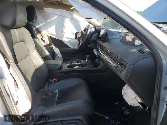 2023 Honda Civic Touring z VIN 2HGFE1F97PH305882, wystawiony jako Copart lot #54826915 z przebiegiem Nie podano mil oraz Szkoda całkowita • Salvage title. Historia ofert i sprzedaży dostępna na DreamBid. Obrazek 7.