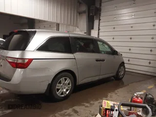 2012 Honda Odyssey LX with VIN 5FNRL5H27CB092988, listed as a IAAI auction lot 41933507 with 123,233 mi miles and . Bid and sale history available at DreamBid. Image 14.