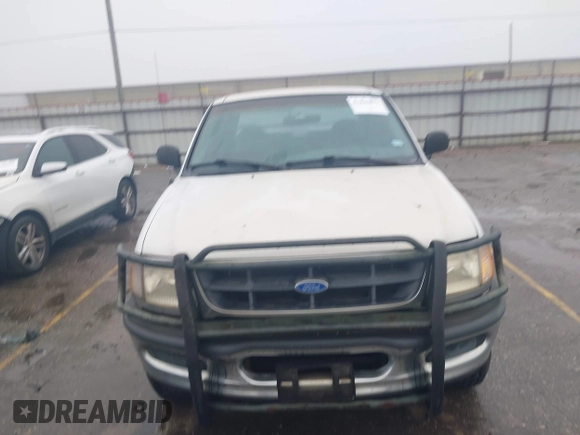 1997 Ford F-150 XL with VIN 1FTDX1863VNB01474, listed as a IAAI auction lot 41446672 with 223,296 mi miles. Bid and sale history available at carsss.com. Image 12.