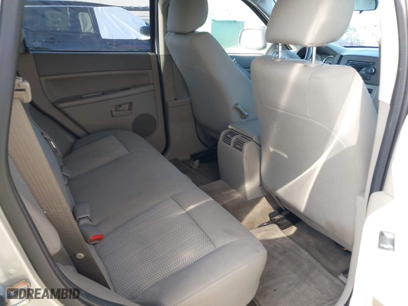 2007 Jeep Grand Cherokee Laredo with VIN 1J8GS48K77C545071, listed as a IAAI auction lot 41999998 with 144,966 mi miles. Bid and sale history available at carsss.com. Image 8.
