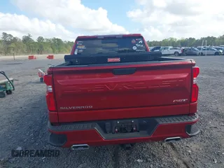 2022 Chevrolet Silverado 1500 RST with VIN 1GCUDEETXNZ561489, listed as a IAAI auction lot 41959032 with 80,614 mi miles and . Bid and sale history available at DreamBid. Image 16.