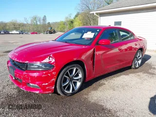 2015 Dodge Charger SXT with VIN 2C3CDXHGXFH858399, listed as a IAAI auction lot 42090958 with 71,488 mi miles and . Bid and sale history available at DreamBid. Image 2.