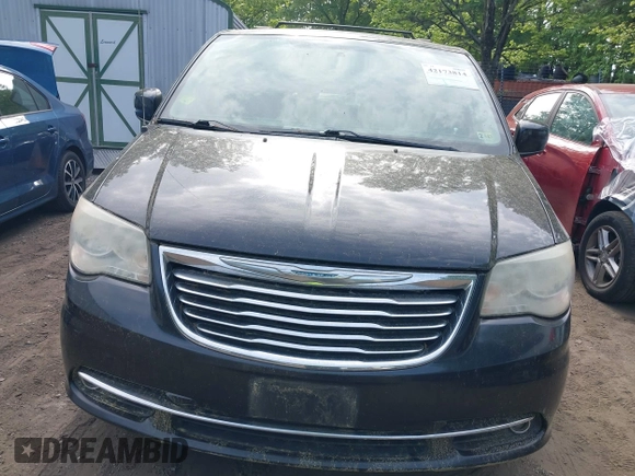2012 Chrysler Town & Country Touring with VIN 2C4RC1BG7CR301101, listed as a IAAI auction lot 42173814 with 141,128 mi miles. Bid and sale history available at carsss.com. Image 6.
