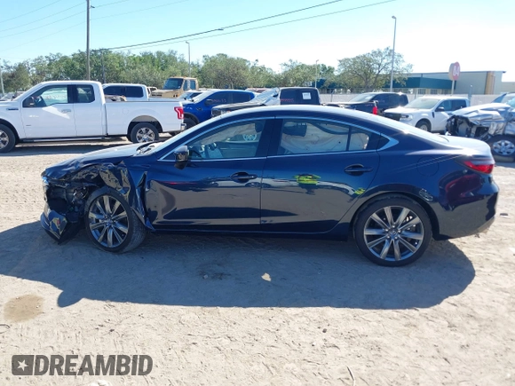 2021 Mazda 6 Grand Touring with VIN JM1GL1TY3M1619771, listed as a IAAI auction lot 40964809 with 25,816 mi miles and . Bid and sale history available at DreamBid. Image 14.