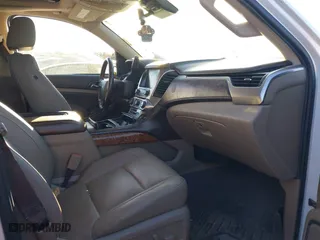 2019 Chevrolet Suburban Premier with VIN 1GNSCJKC0KR293658, listed as a IAAI auction lot 40563834 with 153,619 mi miles. Bid and sale history available at carsss.com. Image 5.