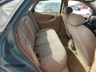 1997 Ford Taurus LX z VIN 1FALP53S1VG316689, wystawiony jako Copart lot #67168694 z przebiegiem 211 414 mil mil oraz Szkody całkowita. Historia ofert i sprzedaży dostępna na DreamBid. Obrazek 10.