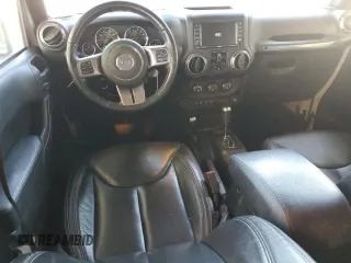 2018 Jeep Wrangler JK Unlimited Sahara with VIN 1C4BJWEGXJL889159, listed as a Copart auction lot 76523774 with 77,528 mi miles and Salvage Title. Bid and sale history available at carsss.com. Image 8.