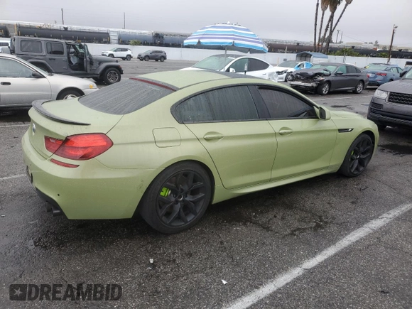 2013 BMW 6 Series 650i with VIN WBA6B2C59DDG66909, listed as a Copart auction lot 86329014 with 131,054 mi miles and Salvage Title. Bid and sale history available at DreamBid. Image 3.