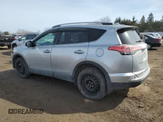 2018 Toyota RAV4 LE with VIN 2T3BFREV9JW754527, listed as a Copart auction lot 48119415 with 217,777 mi miles and Salvage Title. Bid and sale history available at carsss.com. Image 2.