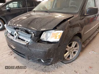2010 Dodge Grand Caravan Crew with VIN 2D4RN6DX1AR438135, listed as a IAAI auction lot 41734378 with 57,041 mi miles and . Bid and sale history available at DreamBid. Image 12.