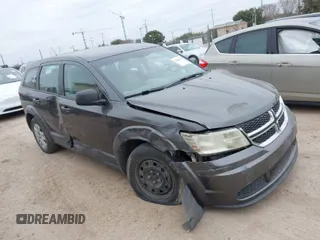 2015 Dodge Journey American Value Pkg with VIN 3C4PDCABXFT516866, listed as a IAAI auction lot 41368372 with 169,026 mi miles. Bid and sale history available at carsss.com. Image 1.