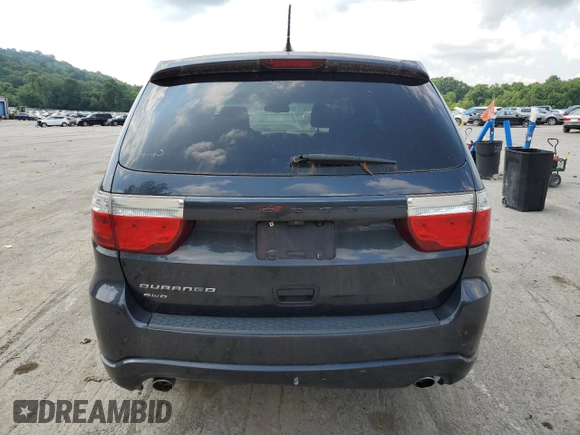 2013 Dodge Durango SXT with VIN 1C4RDJAG2DC679979, listed as a Copart auction lot 64377695 with 209,671 mi miles and Clean title. Bid and sale history available at DreamBid. Image 6.