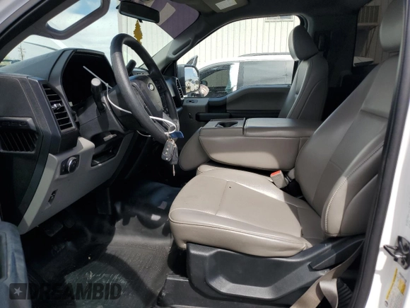 2020 Ford F-150 XL with VIN 1FTMF1CB7LKE65094, listed as a Copart auction lot 54452855 with 32,865 mi miles and Salvage Title. Bid and sale history available at carsss.com. Image 7.