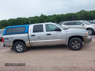 2005 Dodge Dakota SLT with VIN 1D7HW48N65S199887, listed as a IAAI auction lot 42508977 with 192,330 mi miles and . Bid and sale history available at DreamBid. Image 12.