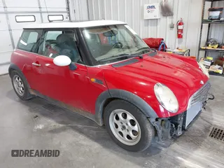 2005 MINI Hardtop with VIN WMWRC33555TJ69375, listed as a IAAI auction lot 42588171 with 216,901 mi miles and . Bid and sale history available at DreamBid. Image 1.