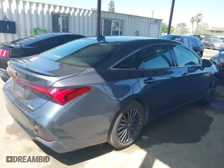 2019 Toyota Avalon Hybrid Limited with VIN 4T1B21FB4KU005887, listed as a IAAI auction lot 42014462 with 141,213 mi miles. Bid and sale history available at carsss.com. Image 4.