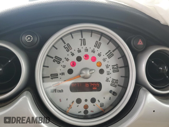 2005 MINI Hardtop z VIN WMWRC33465TC56731, wystawiony jako Copart lot #56404125 z przebiegiem 167 455 mil mil oraz Szkoda całkowita • Salvage title. Historia ofert i sprzedaży dostępna na DreamBid. Obrazek 9.