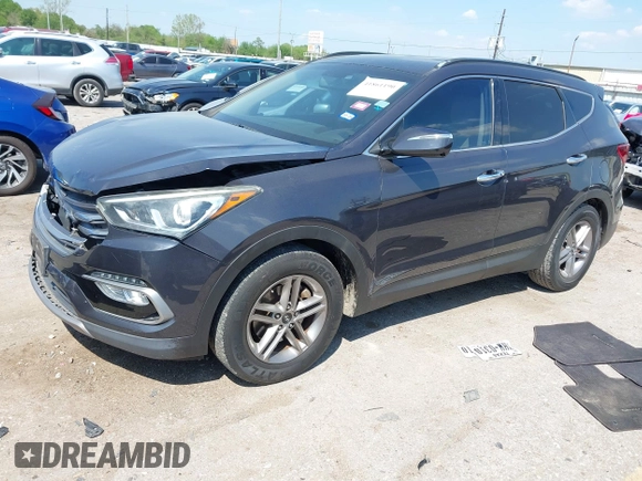 2017 Hyundai Santa Fe 2.4L z VIN 5XYZU3LB4HG462058, wystawiony jako IAAI lot #41861190 z przebiegiem 87 102 mil mil oraz . Historia ofert i sprzedaży dostępna na DreamBid. Obrazek 17.