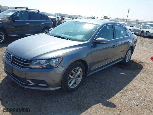 2016 Volkswagen Passat 1.8T S with VIN 1VWAT7A31GC057486, listed as a IAAI auction lot 41870040 with 127,817 mi miles. Bid and sale history available at carsss.com. Image 2.