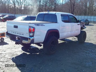 2020 Toyota Tacoma SR5 with VIN 3TMAZ5CN4LM132002, listed as a IAAI auction lot 41224844 with 55,000 mi miles and . Bid and sale history available at DreamBid. Image 4.