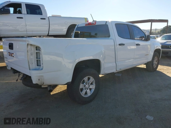 2015 GMC Canyon 2WD with VIN 1GTG5AE39F1140916, listed as a IAAI auction lot 41298357 with 96,050 mi miles and . Bid and sale history available at DreamBid. Image 4.