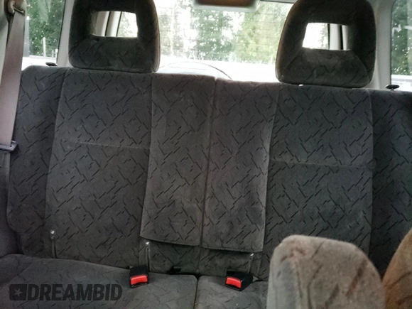 2003 Chevrolet Tracker ZR2 z VIN 2CNBJ734736946410, wystawiony jako Copart lot #82210474 z przebiegiem 61 414 mil mil oraz Szkoda całkowita • Salvage title. Historia ofert i sprzedaży dostępna na DreamBid. Obrazek 10.