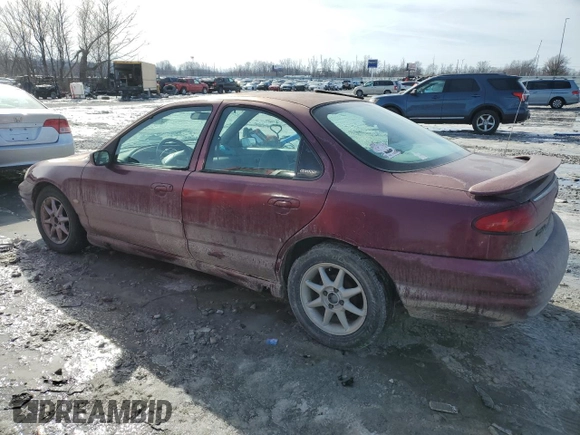 1998 Ford Contour LX with VIN 1FAFP66L4WK261970, listed as a Copart auction lot 42735485 with 106,450 mi miles and Salvage title. Bid and sale history available at DreamBid. Image 2.
