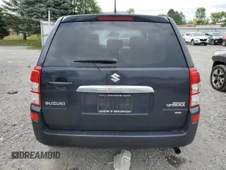 2013 Suzuki Grand Vitara Premium z VIN JS3TD0D65D4100272, wystawiony jako Copart lot #65140134 z przebiegiem 108 261 mil mil oraz Szkoda całkowita • Salvage title. Historia ofert i sprzedaży dostępna na DreamBid. Obrazek 6.