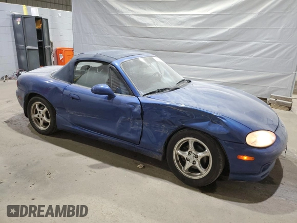 1999 Mazda MX-5 Miata with VIN JM1NB3532X0136645, listed as a Copart auction lot 59480265 with 160,936 mi miles and Clean title. Bid and sale history available at DreamBid. Image 4.