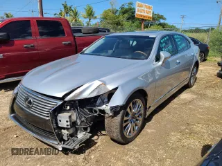 2015 Lexus LS 460 L with VIN JTHGL5EFXF5055498, listed as a Copart auction lot 82579834 with 112,465 mi miles and Salvage title. Bid and sale history available at DreamBid. Image 1.