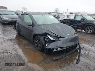 2025 Tesla Model Y Long Range with VIN 7SAYGDED6SF226035, listed as a IAAI auction lot 41102115 with Not Provided miles and . Bid and sale history available at DreamBid. Image 6.