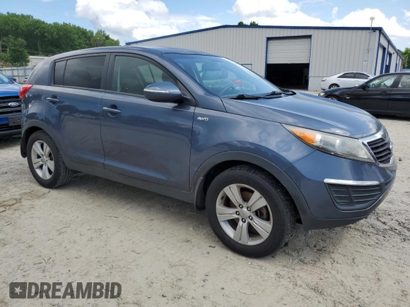 2012 Kia Sportage LX with VIN KNDPBCA27C7330112, listed as a Copart auction lot 59872465 with 220,929 mi miles and Clean title. Bid and sale history available at DreamBid. Image 4.