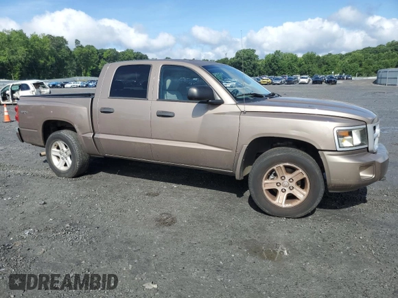 2010 Dodge Dakota Bighorn/Lonestar z VIN 1D7RW3GK7AS223579, wystawiony jako Copart lot #61880374 z przebiegiem 102 134 mil mil oraz Czysty tytuł • Clean title. Historia ofert i sprzedaży dostępna na DreamBid. Obrazek 4.