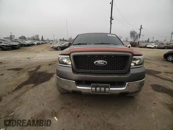 2004 Ford F-150 STX with VIN 1FTRX02W74KC08388, listed as a Copart auction lot 87290524 with 189,003 mi miles and Salvage title. Bid and sale history available at DreamBid. Image 11.