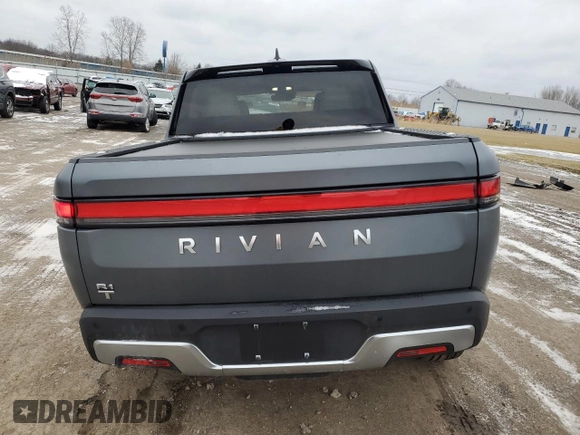 2024 Rivian R1T Adventure with VIN 7FCTGBAA8RN034399, listed as a Copart auction lot 86857044 with 8,176 mi miles and Salvage Title. Bid and sale history available at carsss.com. Image 6.