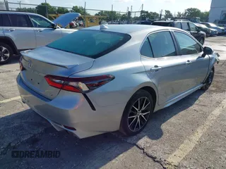 2023 Toyota Camry SE with VIN 4T1G11AK5PU750719, listed as a IAAI auction lot 42133210 with 55,688 mi miles. Bid and sale history available at carsss.com. Image 4.