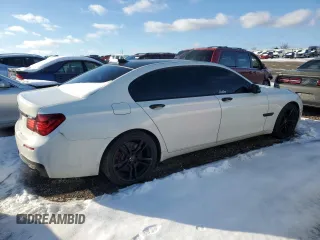 2014 BMW 7 Series ALPINA B7 with VIN WBAYE8C55ED135790, listed as a Copart auction lot 41574755 with 128,255 mi miles and Salvage Title. Bid and sale history available at carsss.com. Image 3.