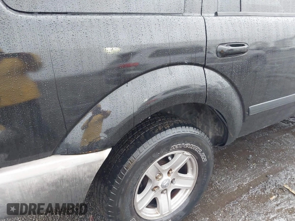2005 Dodge Durango SXT with VIN 1D4HB38N35F554011, listed as a IAAI auction lot 40873398 with 170,538 mi miles and . Bid and sale history available at DreamBid. Image 13.
