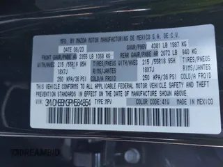 2023 Mazda CX-30 2.5 S Select Package with VIN 3MVDMBBM3PM584854, listed as a IAAI auction lot 41736925 with 39,008 mi miles. Bid and sale history available at carsss.com. Image 9.
