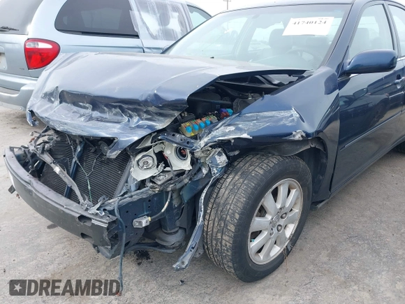 2004 Toyota Camry LE with VIN 4T1BF30K44U069441, listed as a IAAI auction lot 41740124 with 145,906 mi miles. Bid and sale history available at carsss.com. Image 6.