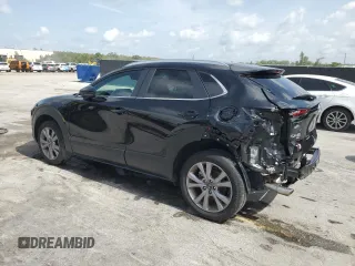 2023 Mazda CX-30 S Carbon Edition z VIN 3MVDMBCM2PM572015, wystawiony jako Copart lot #60109135 z przebiegiem 27 790 mil mil oraz Szkoda całkowita • Salvage title. Historia ofert i sprzedaży dostępna na DreamBid. Obrazek 2.