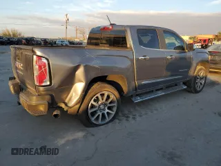 2021 GMC Canyon 4WD Denali with VIN 1GTG6EEN4M1130779, listed as a Copart auction lot 82695044 with 38,662 mi miles and Salvage Title. Bid and sale history available at carsss.com. Image 3.
