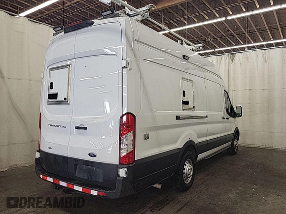 2023 Ford Transit Cargo with VIN 1FTBW3U84PKB20116, listed as a IAAI auction lot 42748031 with 6,591 mi miles and . Bid and sale history available at DreamBid. Image 7.